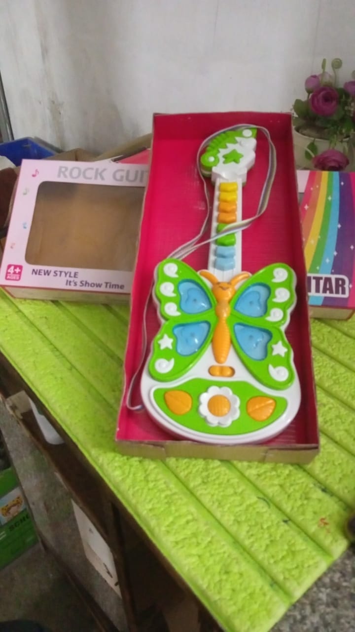 Butterfly Guitar Toy with Light and Music Toy (1 Pc / Battery not included) Butterfly Guitar Toy with Light and Music Toy (1 Pc / Battery not included)